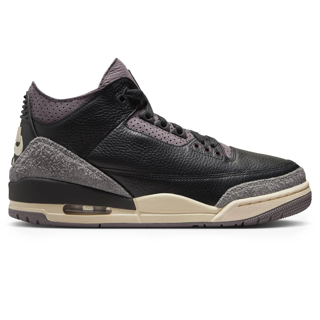 A Ma Maniére x Air Jordan 3 Retro Black Violet Ore (W) features a sleek black design with an off-white midsole.